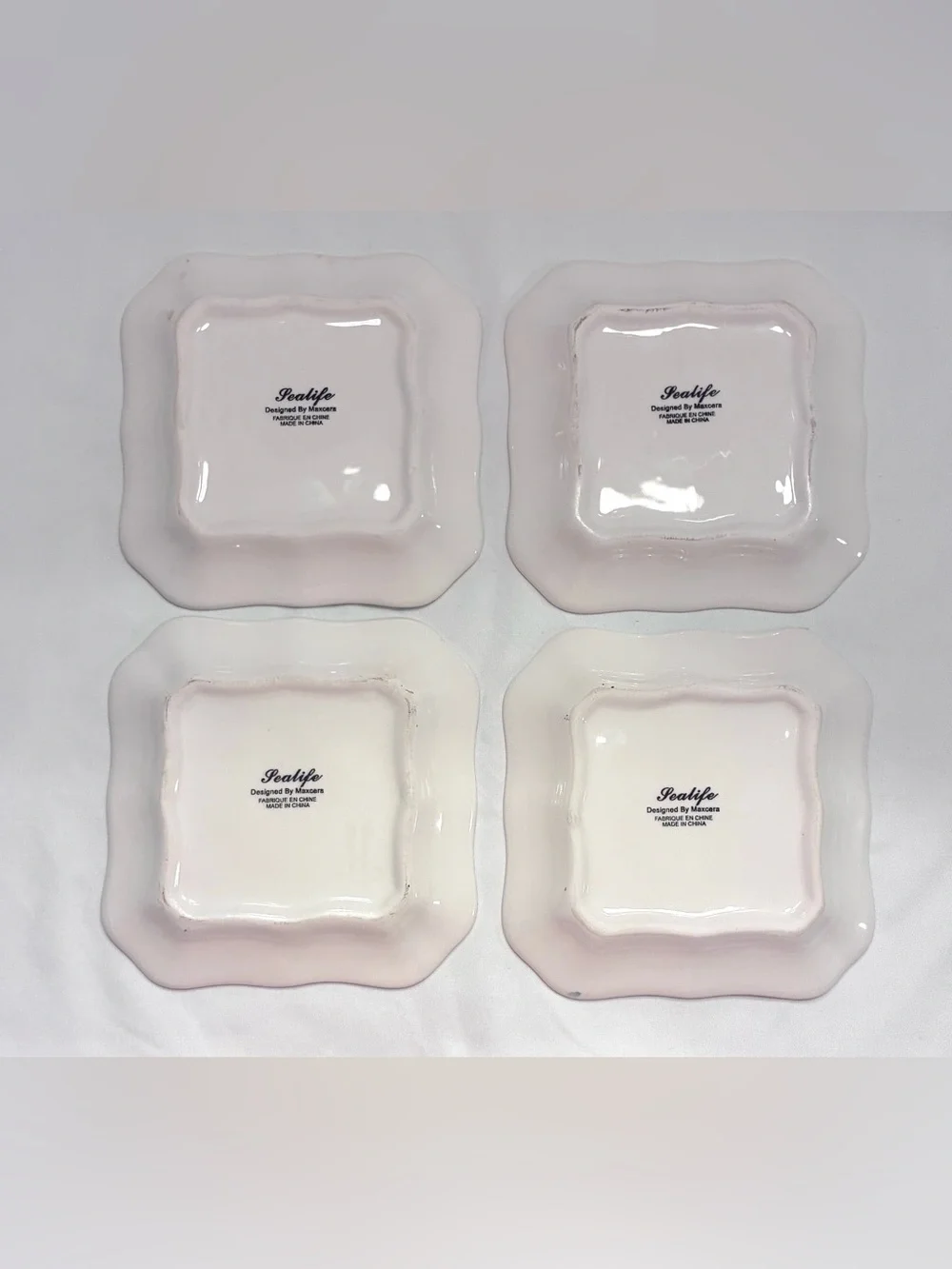 Maxcera “Sealife” - four ceramic square plates, 5” x 5”